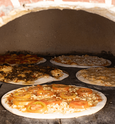 sabores pizza al horno en cinque terre en Solaris Cancun